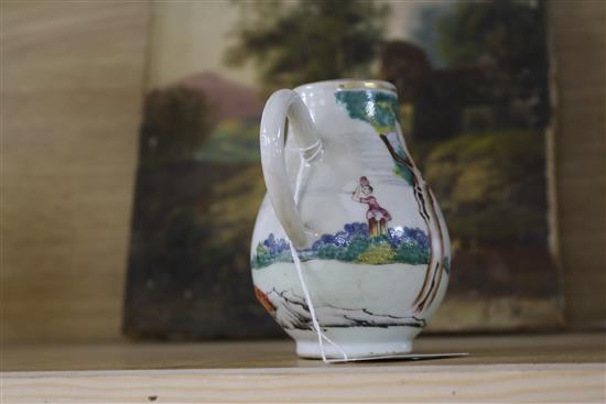 A Chinese Export polychrome sparrowbeak cream jug in the European taste, a punch bowl and a plate (damage and repairs)